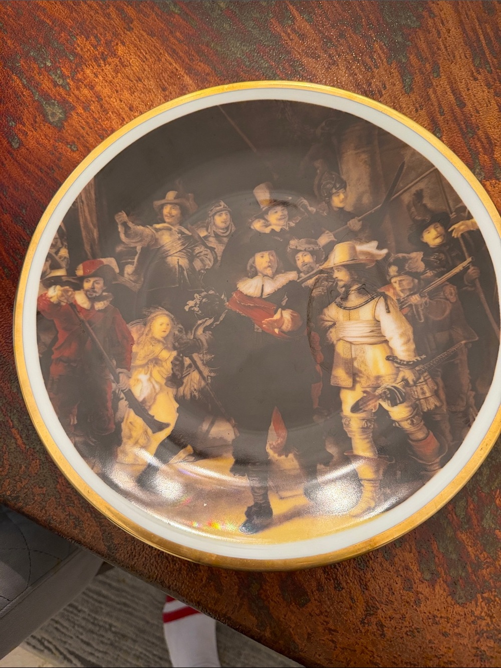 Brown and Gold Decorative Wall Plate with Historic Scene